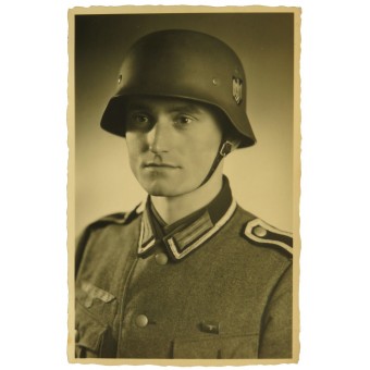 Unteroffizier alemana en el casco de acero del segundo Batallón MG. Espenlaub militaria